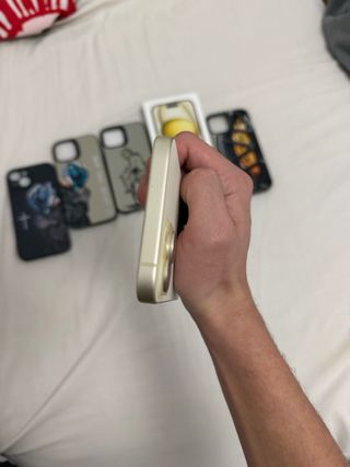 iPhone 15 Blanco/Dorado