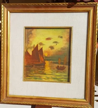 Quadro con cornice dorata e tela