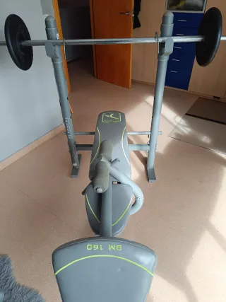 Banco de pesas con barra y 2 discos 10kg