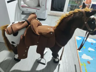 Caballo de peluche con música