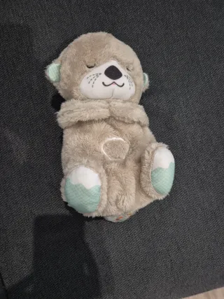 Peluche marmota bebé durmiendo.