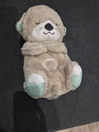 Peluche marmota bebé durmiendo.