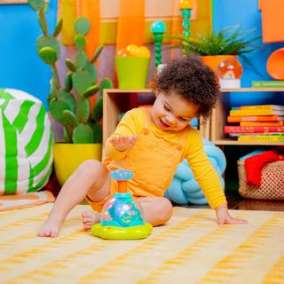 Bright Starts, Juguete Muiscal Press & Glow Spinne