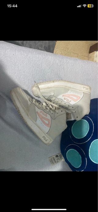 Zapatillas Fila blancas y rosas les daria lavada
