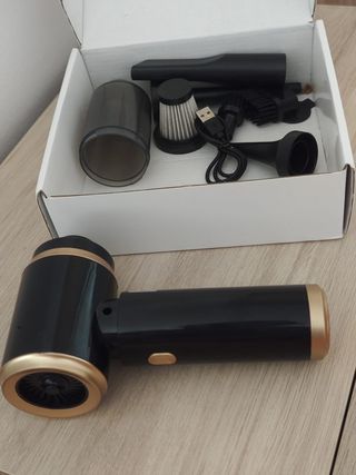 Aspirador de mão portátil