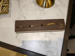 Bracciale Comete oro e nero