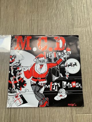 MCD Les desea Merry Krismas Punk Rock