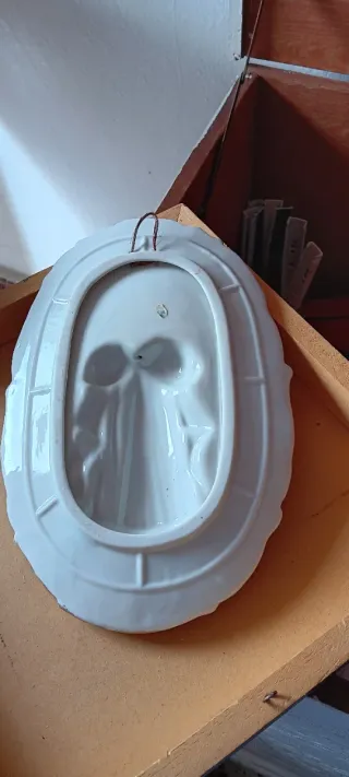 Adorno de porcelana músico con flauta