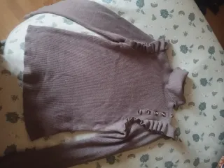 Jersey cuello alto con volantes