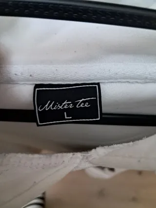 Sudadera blanca con dibujo de muñeco