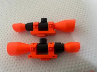 Accesorios Nerf: 2 miras, 3 cargadores, 1 pistola