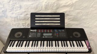 Teclado RockJam con soporte y banqueta