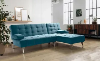 Sofá cama azul de terciopelo