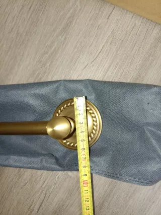 Soporte toallero dorado metal