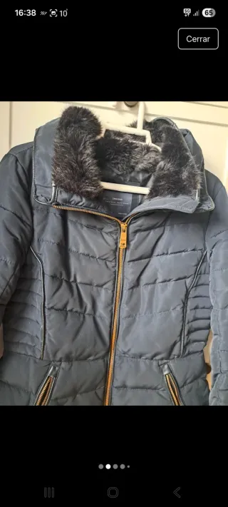 Plumifero negro con cuello de pelo