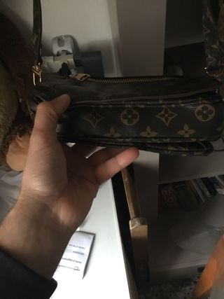 Borsa Louis Vuitton marrone con dettagli oro
