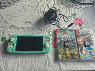 Nintendo Switch Lite + 3 juegos + accesorios