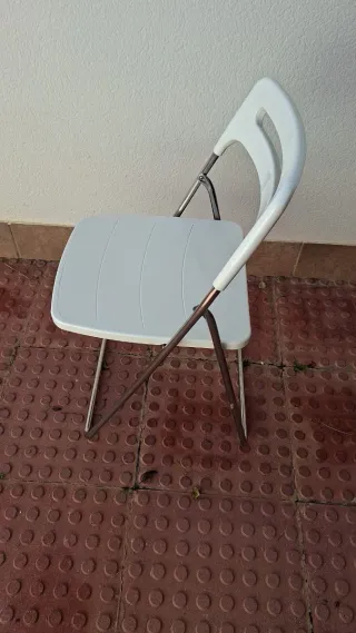 Silla plegable naranja, blanca