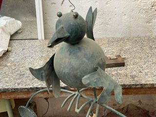 Pájaro de hierro decorativo