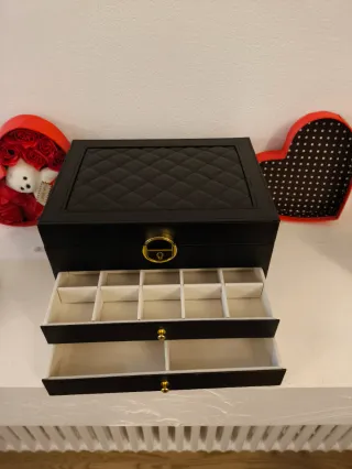 Portagioie di lusso nero e oro