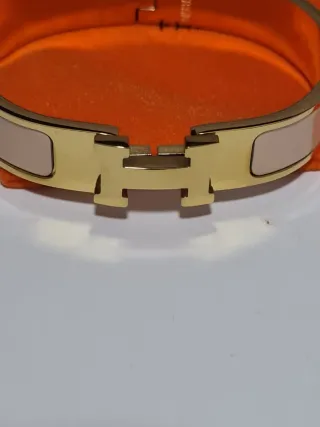 Pulsera Hermes H Dorada y rosa palido