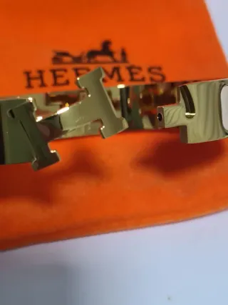 Pulsera Hermes H Dorada y rosa palido