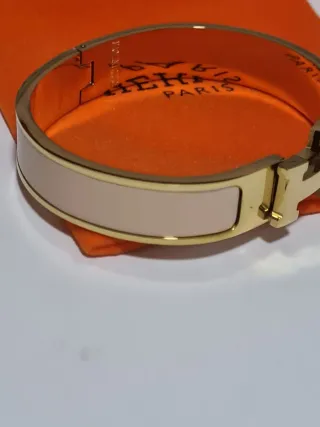 Pulsera Hermes H Dorada y rosa palido