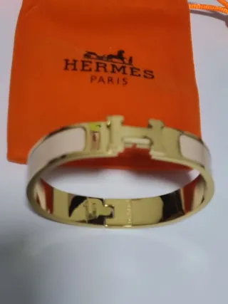 Pulsera Hermes H Dorada y rosa palido