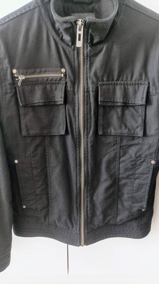 Cazadora negra con cremallera para hombre o niño