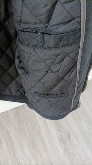 Cazadora negra con cremallera para hombre o niño