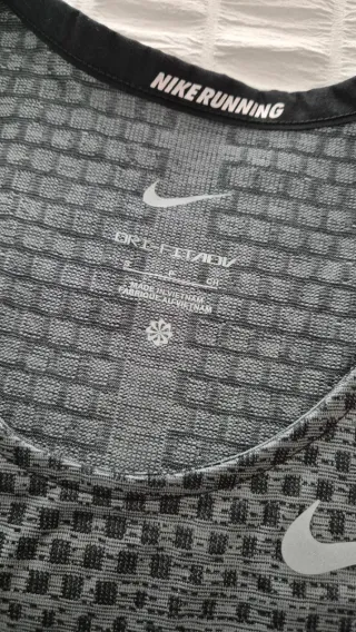 Camiseta tirantes running Nike gris