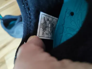 Calzado deportivo Merrell negro y turquesa