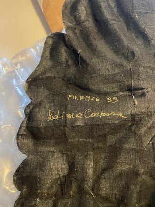 Pannello decorativo dorato volto a forma di sole