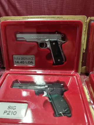 4 miniature  pistole da collezione