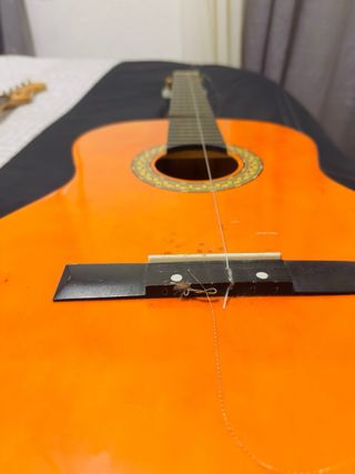 Guitarras Eléctrica Negra y española color madera