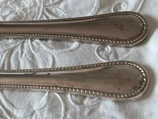 2 Apribottiglie Vintage Silverplated