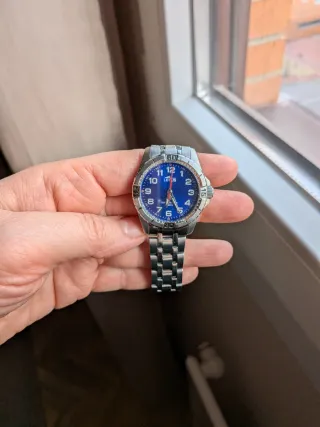 Reloj LOTUS niño azul y acero, en su caja.