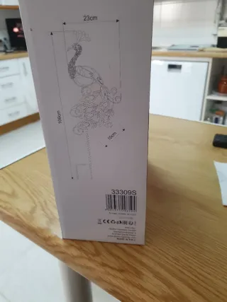 Luz solar decorativa de pavo real