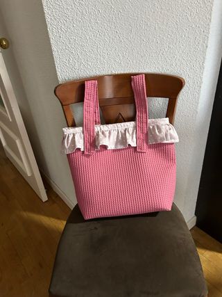 Bolsa para bebé rosa con volantes