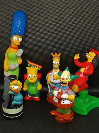 Lote DVDs, y figuras de Los Simpson