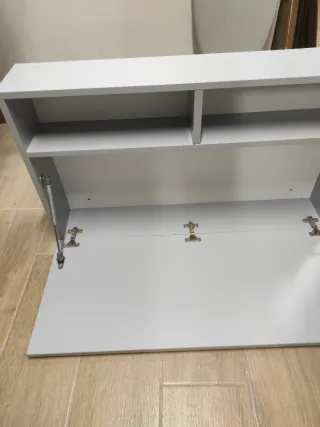 Mesa abatible pared gris