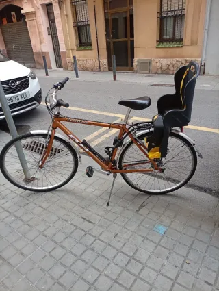Bicicleta BH avec chaise pour enfants.