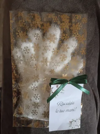 Guanti donna bianchi morbidi.