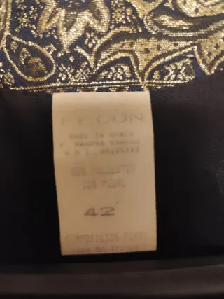 Chaqueta de fiesta dorada y negra