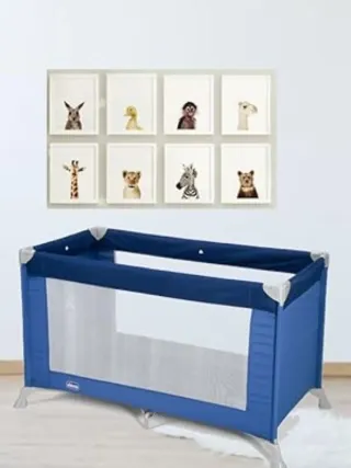 Cuna de viaje Chicco azul + colchón en rosa.