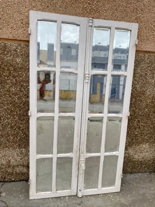 Hojas de ventana de 2 hojas de madera con cristal.