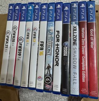 Consola PS4 + Mando + 12 Juegos