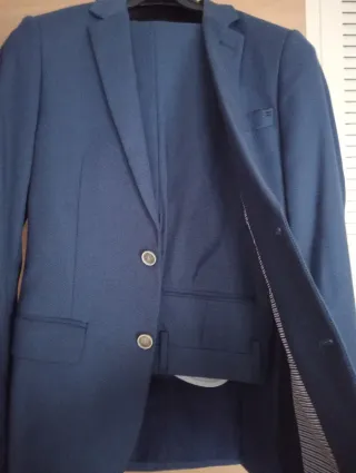 Traje chaqueta y pantalón de hombre, azul.Talla S.