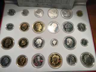Colección de monedas de plata y oro
