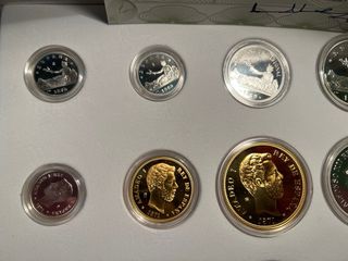 Colección de monedas de plata y oro
